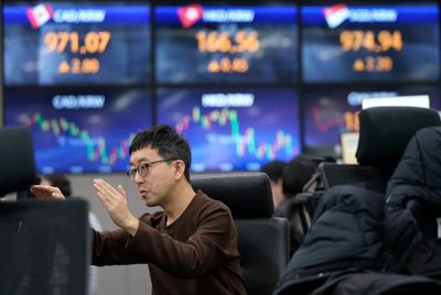 Stock market today: Asian shares mostly lower as Bank of Japan meets, China property shares fall