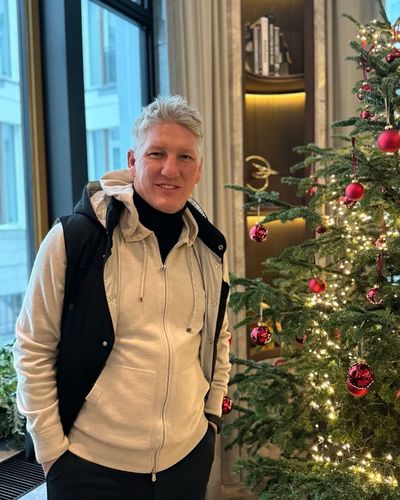 Bastian Schweinsteiger Radiates Holiday Joy in Festive Christmas Portrait