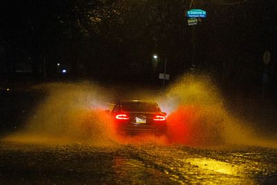 Flood and wind warnings issued, airlines and schools affected as strong storm hits the Northeast