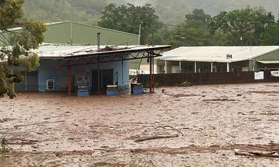 Residents of flooded north Queensland town Wujal Wujal arrive in Cooktown as evacuation efforts continue