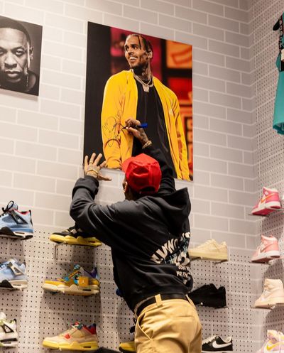 Chris Brown Exudes Coolness in Shopping Mode, Pondering Purchase Options