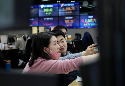 Stock market today: Asian shares are mixed as Bank of Japan keeps its monetary policy unchanged