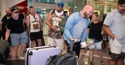 Carousel of love: Canberra airport passengers find special gift with their luggage