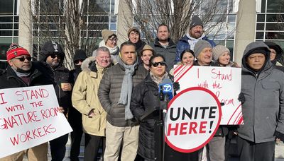 Workers at shuttered Signature Room rally to get their jobs back from any future tenant in the space