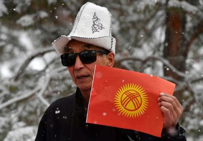 Kyrgyzstan Backs New Flag, Says 'Smiling' Sun To Aid Growth