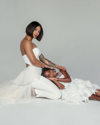 Massy Arias and little girl shine in white elegance together