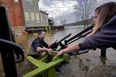 Maine governor tells residents to stay off the roads as some rivers continue rising after storm