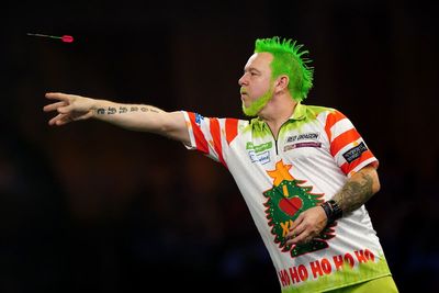 Peter Wright crashes out of World Darts Championship while dressed as the Grinch