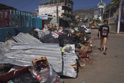 Mexico's president predicts full recovery for Acapulco, but resort residents see difficulties