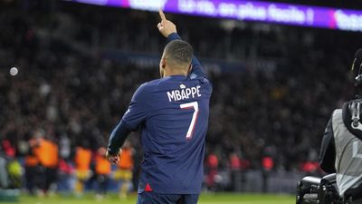Double treat for birthday boy Mbappé as PSG beat Metz to stay top of Ligue 1