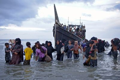 5 more boats packed with refugees approach Indonesia's shores, air force says
