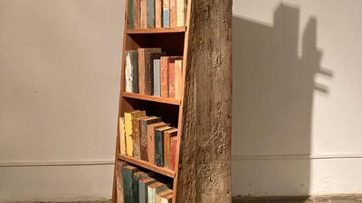 Artist Benitha Perciyal’s series of wooden books is on display at Serendipity Arts Festival