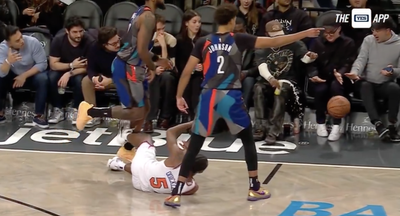 Nets Announcer Had Perfect Call of Travis Scott’s Drink Getting Crushed By Loose Ball