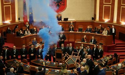 Smoke bombs in parliament as Albania’s former leader stripped of immunity