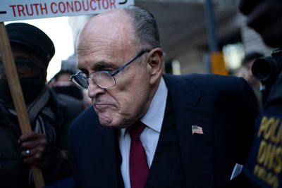 Rudy Giuliani files for bankruptcy after being ordered to pay $148m to election workers he defamed