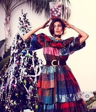 Eva Mendes Embraces Holiday Magic in Chequered Dress and Decorations