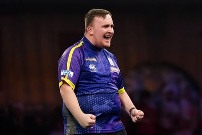 Luke Littler continues dream World Championship with victory over Andrew Gilding