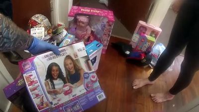 People charged after toy shop robbed, staff member hurt