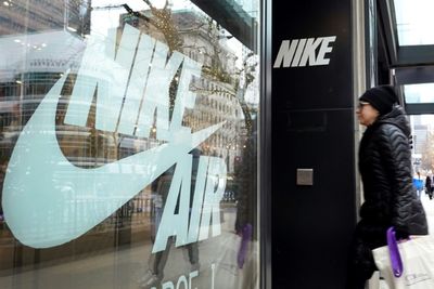 Nike Shares Tumble As It Cuts Costs Amid 'Softer' Outlook