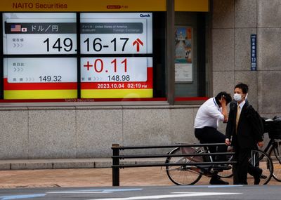 Asia stocks cautiously await US inflation, gains slim momentum