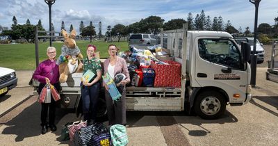 Volunteers begin bump-in for a festive feast on the Newcastle foreshore