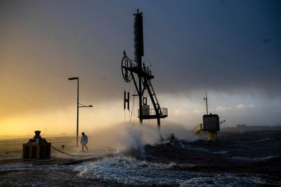 A storm in Europe disrupts German trains. A woman was killed by a falling Christmas tree in Belgium