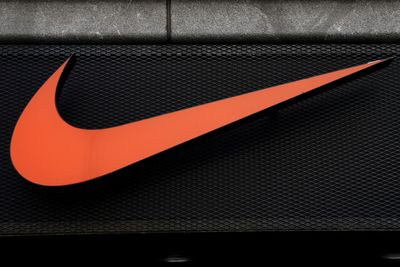 Nike Tiptoes as Consumer Spending Sinks, Stock Forecast Shrinks