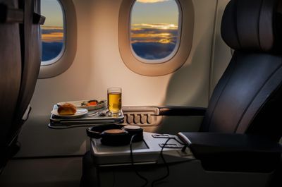 Free-flowing alcohol and a fully flat bed: The secret to a free first-class seat upgrade