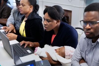 At a church rectory in Boston, Haitian migrants place their hopes on hard work and helping hands