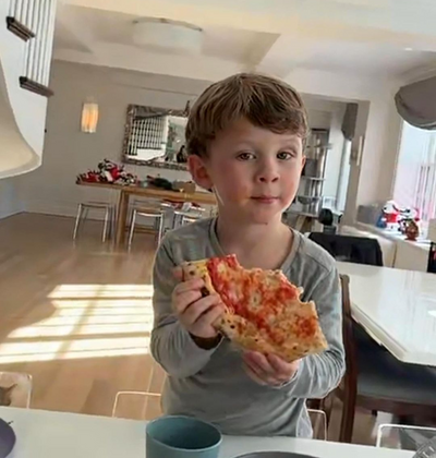 Alec Baldwin's Son Embraces Cool with Trendy Hair and Pizza