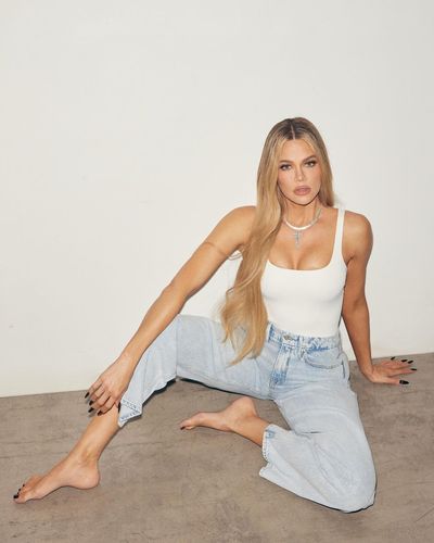 Khlo Kardashian's Stylish White Top and Blue Jeans Look