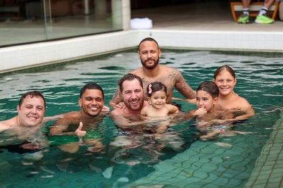 Neymar Embraces Joyful Escape with Friends in Poolside Paradise