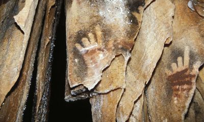 Many prehistoric handprints show a finger missing. What if this was not accidental?