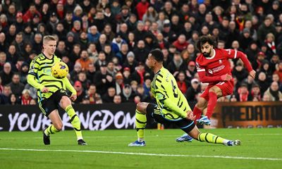Salah’s stunning strike earns Liverpool draw but Arsenal stay top of table