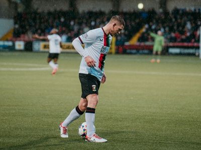 Glentoran FC triumphs, outscoring Dungannon Swifts by a narrow 2-1