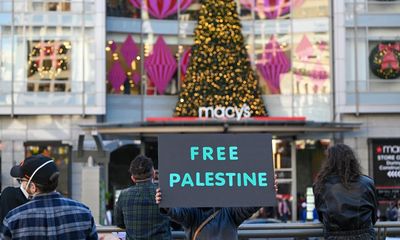 ‘No Xmas as usual’: pro-Palestinian protesters demonstrate in US cities
