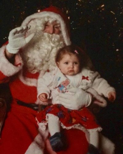 Childhood Christmas Joy: Ivanna McMahon with Santa Claus