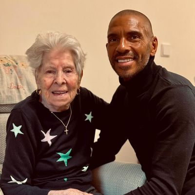 Stan Collymore and his Mother Spread Christmas Cheer in Photoshoot