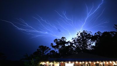 Two dead, four missing as storms lash southeast Qld
