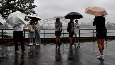Rainfall records likely as storms batter the east coast