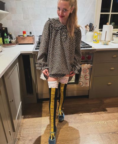 Amanda Seyfried Flaunts Chicken Leg Leggings in Kitchen Selfie