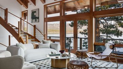 This cozy mountain cabin became a home for all seasons, with elegant interiors and a stunning lakeside view