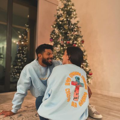 Celebrating the Holiday Spirit: Adrián and his wife radiate joy and warmth