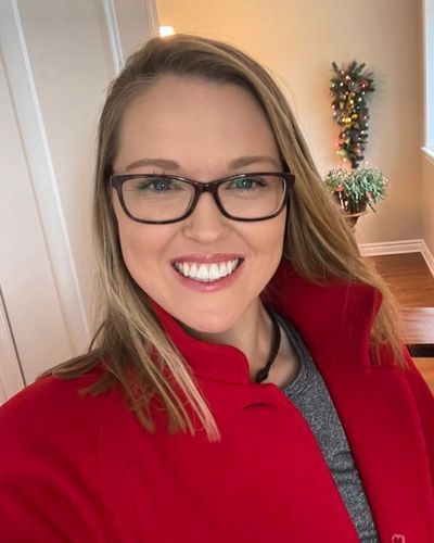 Brooke M. Henderson Shines in Radiant Red, Spreading Christmas Cheer!