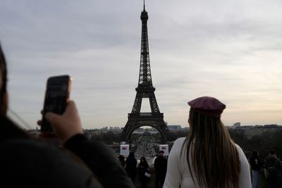 The Eiffel Tower is closed while workers strike on the 100th anniversary of its founder's death