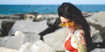 Thinking of a(nother) tattoo this summer? What you need to know about sunburn, sweating and fading