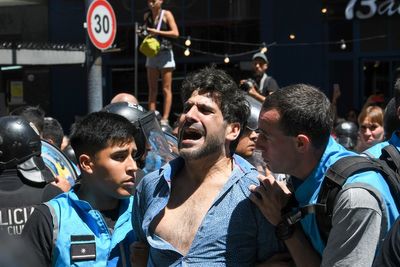 Argentina's unions take to the streets to protest president's cutbacks, deregulation and austerity
