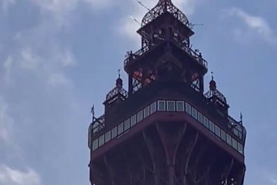 Blackpool Tower fire - live: Police say ‘fire’ at landmark attraction is orange netting