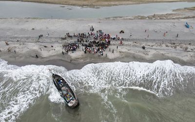 Indonesian navy pushes back Rohingya refugee boat off Aceh