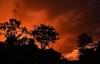 ‘There’s been some tears’: storm and flood-hit Queensland town battles heatwave as more wild weather forecast
